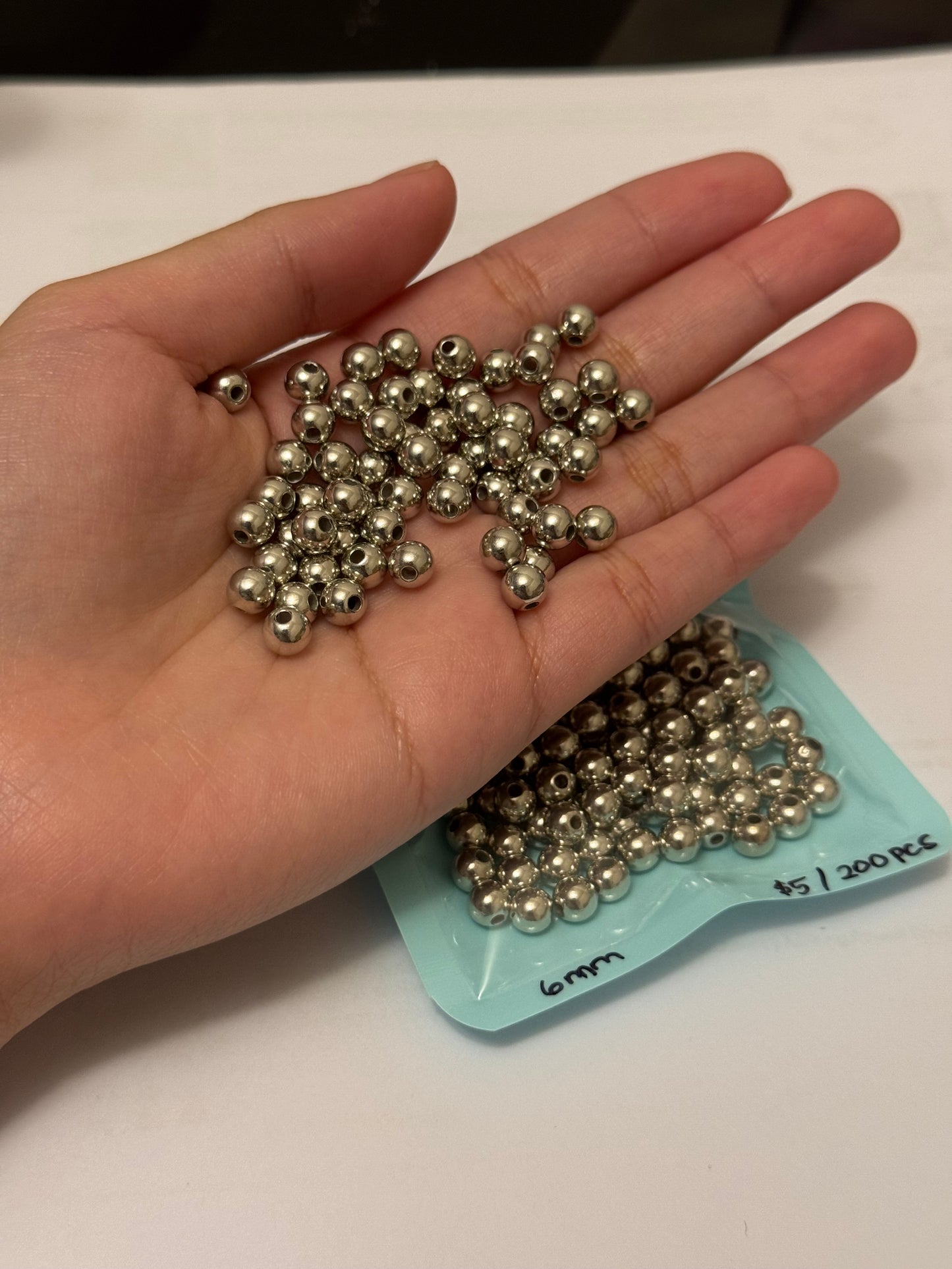 silver round beads